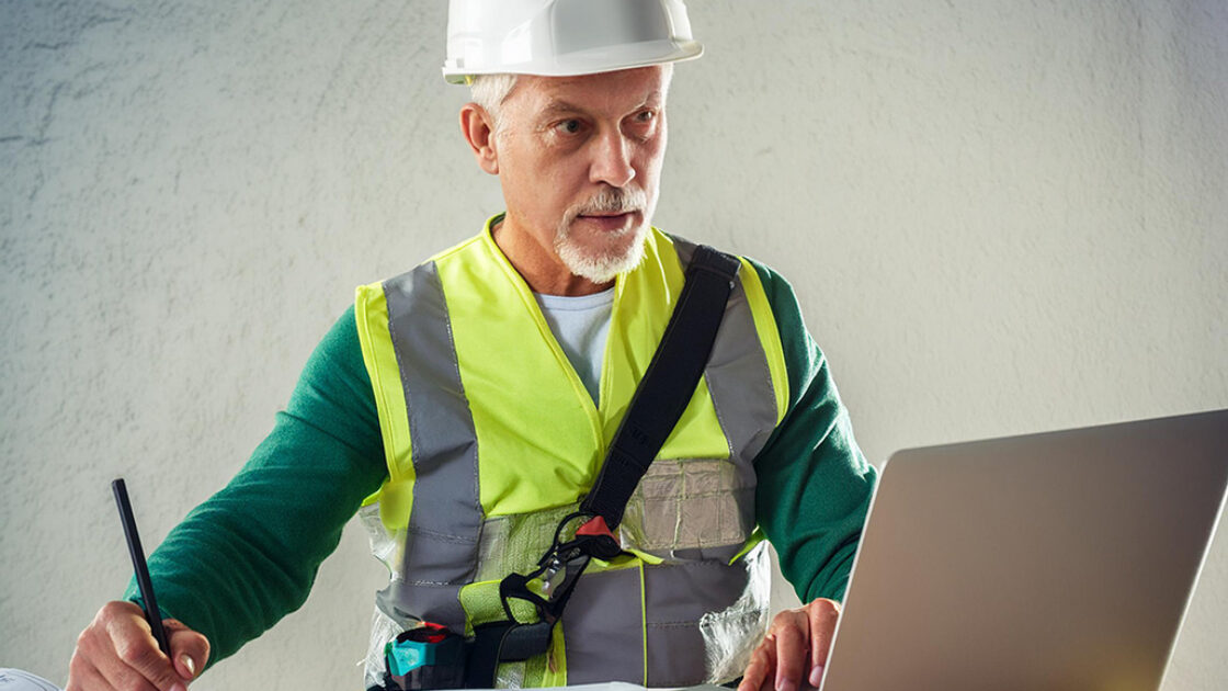 Surveyor doing time consuming computerwork